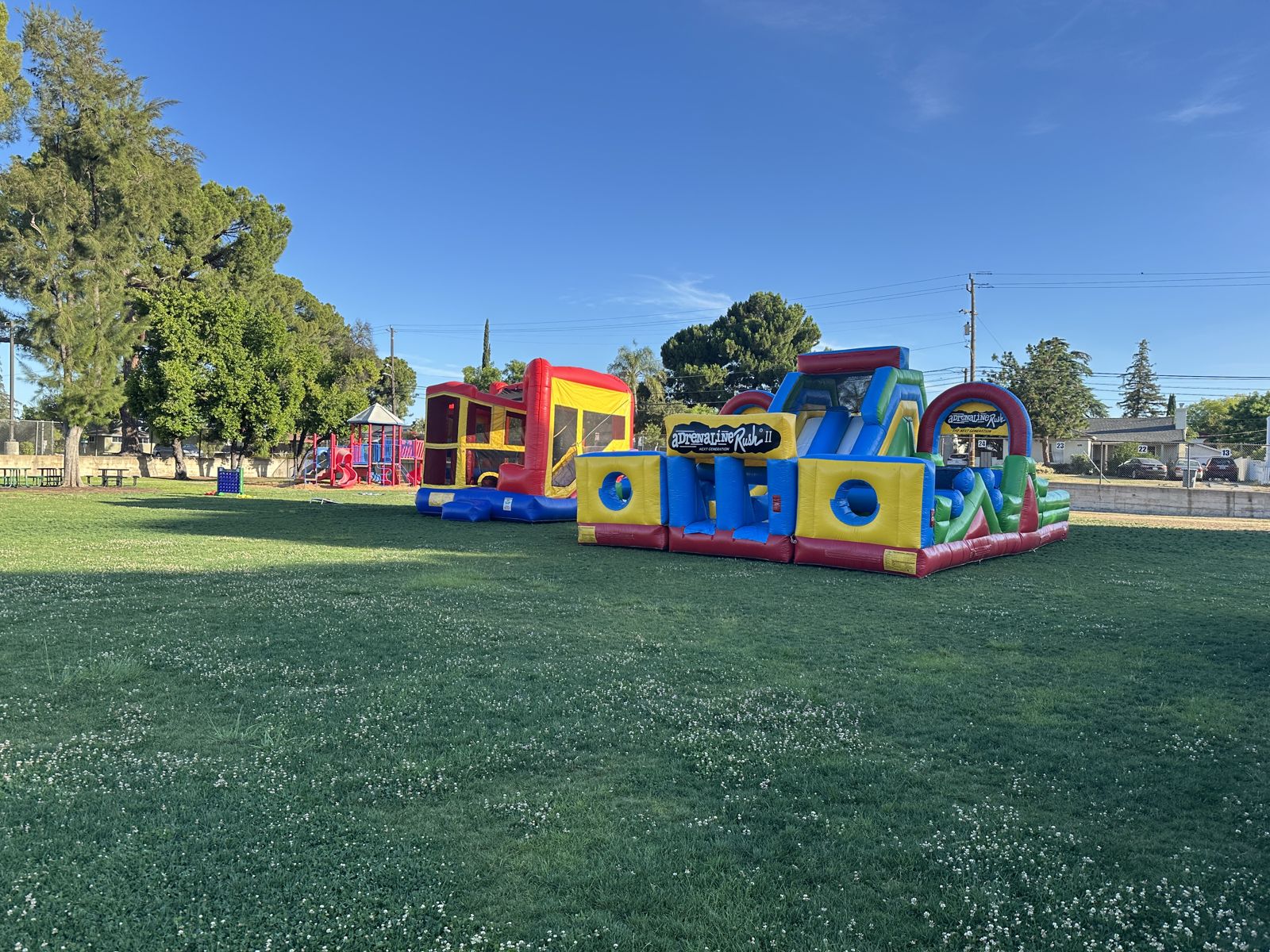 Obstacle courses lined up at a park event