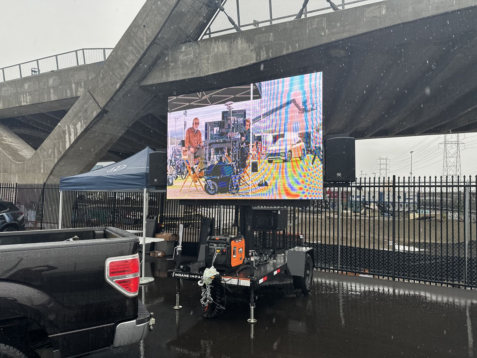 LED wall watch party with vendor tents