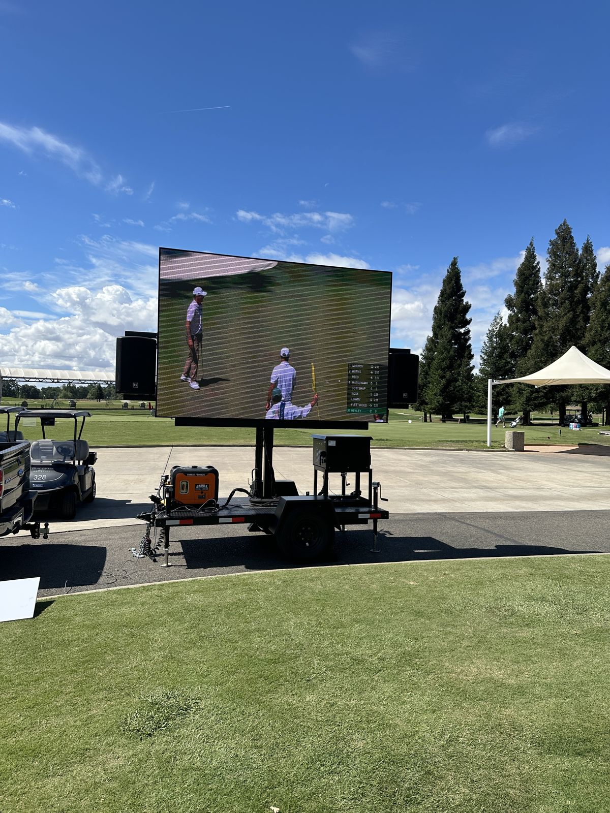 LED wall streaming golf at an outdoor event